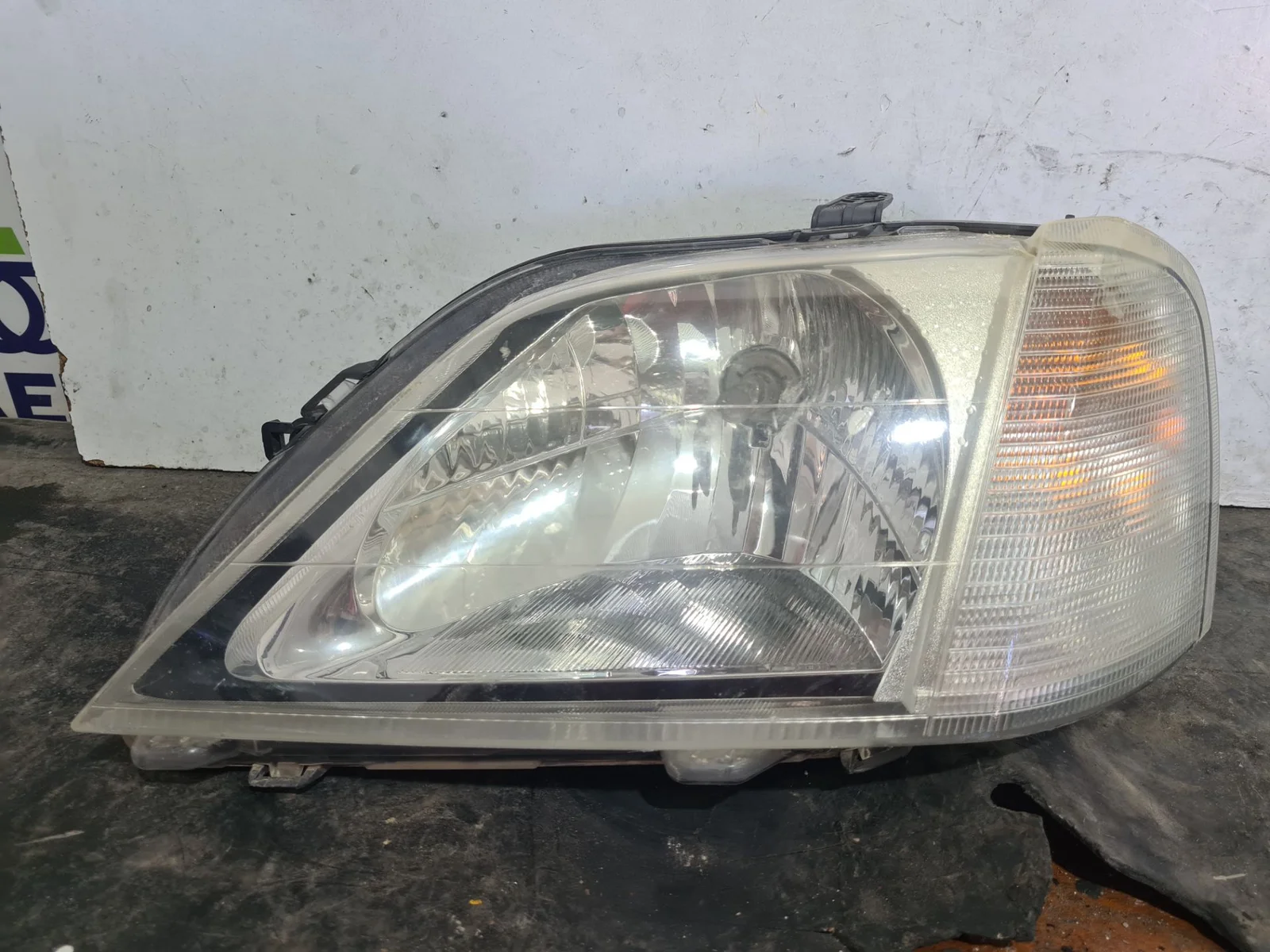 Foto de FARO IZQUIERDO DACIA LOGAN 1 MCV FAMILIAR referencia 89029771