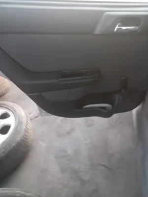 Foto de GUARNECIDO PUERTA TRASERA IZQUIERDA OPEL ASTRA G BERLINA 1.6 CAT (Z 16 SE / L55) (84 CV / 62 KW) referencia 13245783