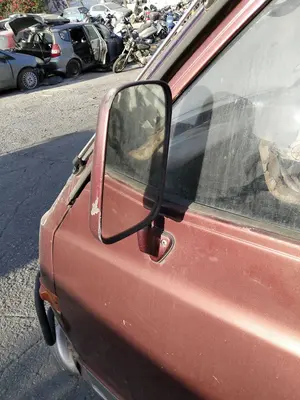 Foto de RETROVISOR IZQUIERDO NISSAN VANETTE (C220) 2.0 Diesel (67 CV / 49 KW) foto 2