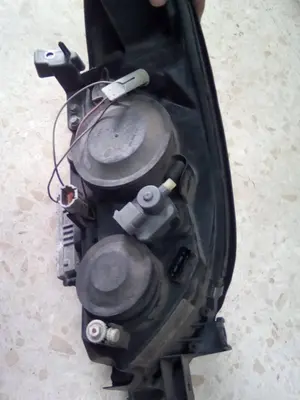 Foto de FARO IZQUIERDO NISSAN PRIMERA BERLINA (P12) referencia 26060AU810 foto 4