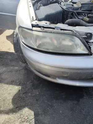 Foto de FARO DERECHO OPEL VECTRA B BERLINA 2.0 DTI (101 CV / 74 KW) referencia 9193244