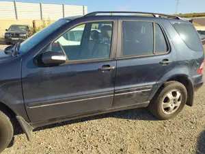 Foto de PUERTA TRASERA IZQUIERDA MERCEDES-BENZ CLASE ML (BM 163) 4.0 CDI 32V CAT (250 CV / 184 KW) referencia A1637301505
