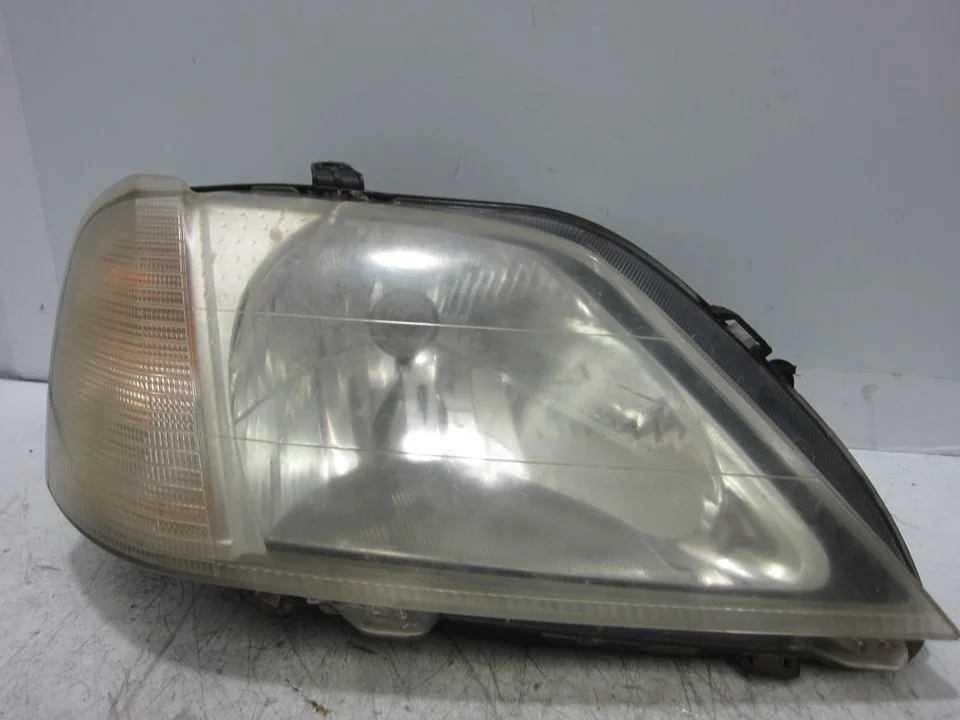 Foto de FARO DERECHO DACIA LOGAN 1 1.6 CAT (87 CV / 64 KW) referencia 8200211006