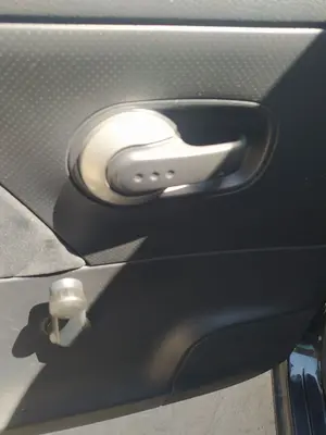Foto de MANETA INTERIOR TRASERA IZQUIERDA NISSAN NOTE (E11E) 1.4 CAT (88 CV / 65 KW)
