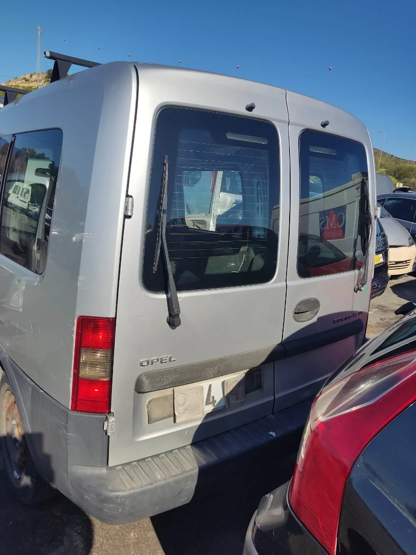 Foto de PORTON TRASERO IZQUIERDO OPEL COMBO (CORSA C) 1.7 16V DI CAT (Y 17 DTL / LK8) (65 CV / 48 KW)