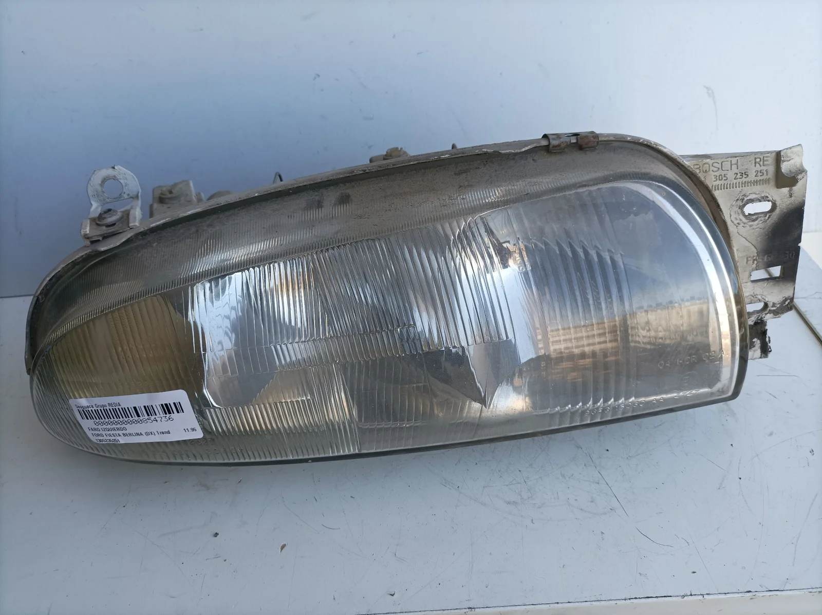 Foto de FARO IZQUIERDO FORD FIESTA BERLINA (DX) 1.8 Diesel CAT (60 CV / 44 KW) referencia 1305235251