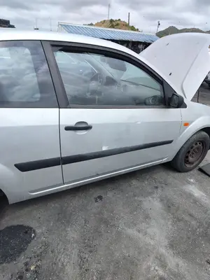 Foto de PUERTA DELANTERA DERECHA FORD FIESTA (CBK) 1.4 TDCi CAT (68 CV / 50 KW) referencia 1692529 foto 2