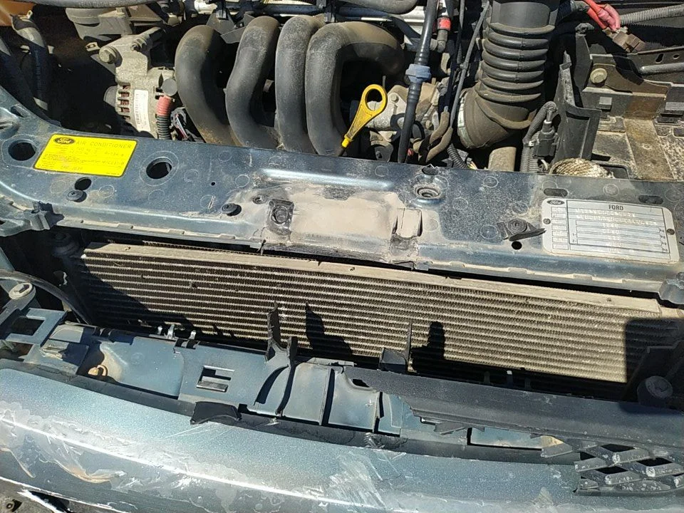 Foto de RADIADOR AGUA FORD FOCUS BERLINA (CAK) 1.6 16V CAT (101 CV / 74 KW) referencia 1671967