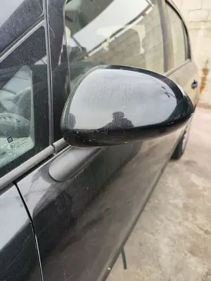 Foto de RETROVISOR IZQUIERDO OPEL CORSA D 1.3 16V CDTI (75 CV / 55 KW)