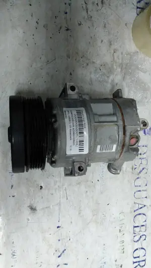 Foto de COMPRESOR AIRE ACONDICIONADO OPEL CORSA E 1.4  (90 CV / 66 KW) referencia 39006353