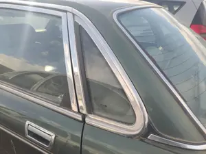 Foto de LUNA CUSTODIA TRASERA IZQUIERDA JAGUAR XJ 4.0 CAT (222 CV / 163 KW)