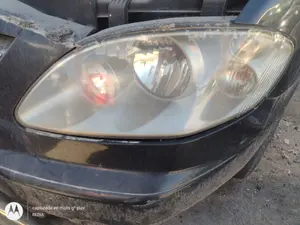Foto de FARO IZQUIERDO SSANGYONG RODIUS 2.7 Turbodiesel CAT (163 CV / 120 KW)