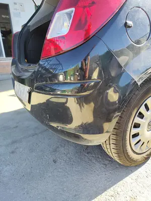Foto de PARAGOLPES TRASERO OPEL CORSA D 1.2 16V CAT (Z 12 XEP / LB4) (80 CV / 59 KW) foto 3