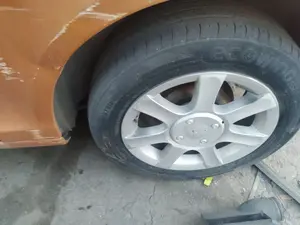 Foto de PASO RUEDA TRASERO IZQUIERDO PEUGEOT 1007 1.4 HDi (68 CV / 50 KW)