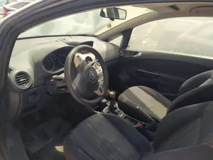 Foto de RETROVISOR INTERIOR OPEL CORSA D 1.2 16V CAT (Z 12 XEP / LB4) (80 CV / 59 KW)
