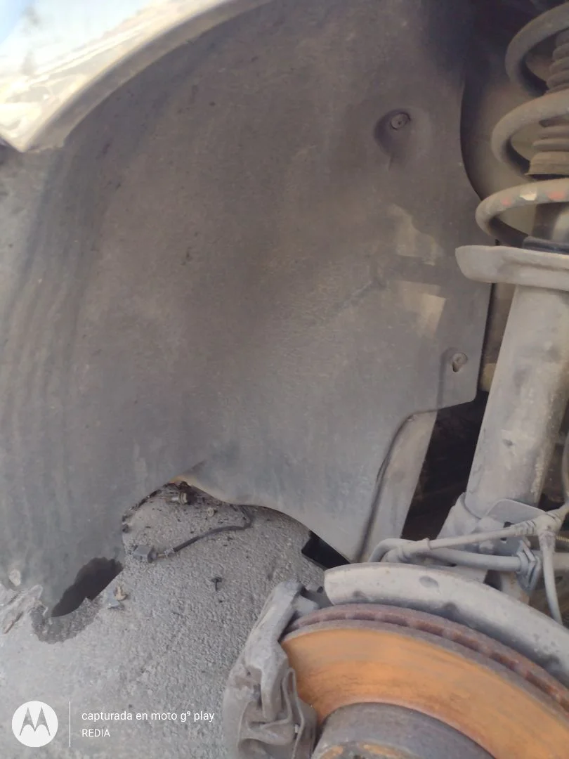 Foto de PASO RUEDA DELANTERO IZQUIERDO VOLKSWAGEN TOURAN (1T2) 1.9 TDI (105 CV / 77 KW) referencia 1T0805911N