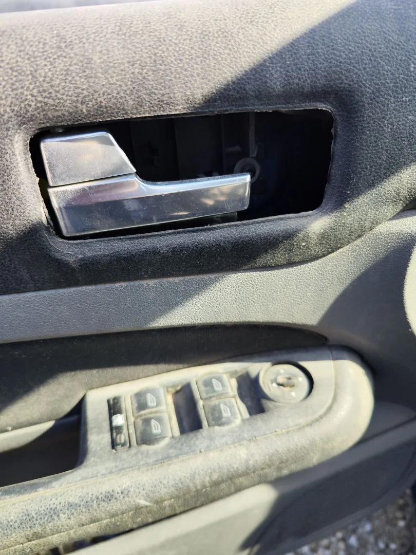 Foto de MANETA INTERIOR DELANTERA IZQUIERDA FORD FOCUS CABRIO (CA5) 2.0 TDCi CAT (136 CV / 100 KW)