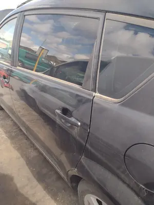 Foto de PUERTA TRASERA IZQUIERDA TOYOTA COROLLA VERSO (R1) 2.2 Turbodiesel CAT (136 CV / 100 KW)
