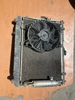 Foto de ELECTROVENTILADOR RADIADOR AIRE ACONDICIONADO KIA CARENS (RP) referencia 0K2KB 15XXX
