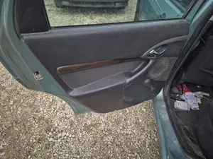 Foto de MANETA INTERIOR TRASERA IZQUIERDA FORD FOCUS FAMILIAR (CAK) 1.8 TDDI Turbodiesel CAT (90 CV / 66 KW)