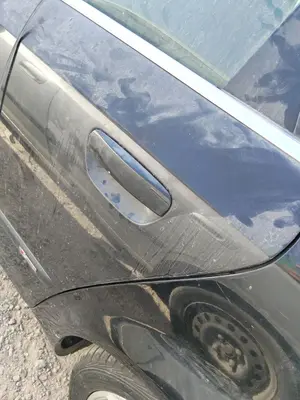Foto de MANETA EXTERIOR TRASERA IZQUIERDA AUDI A4 AVANT (8E) 1.9 TDI (131 CV / 96 KW) referencia 8E0839207