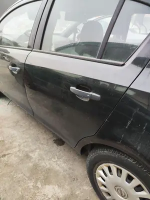 Foto de PUERTA TRASERA IZQUIERDA OPEL CORSA D 1.3 16V CDTI (75 CV / 55 KW)