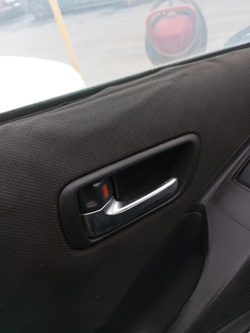 Foto de MANETA INTERIOR DELANTERA IZQUIERDA TOYOTA COROLLA VERSO (R1) 2.2 Turbodiesel CAT (136 CV / 100 KW)