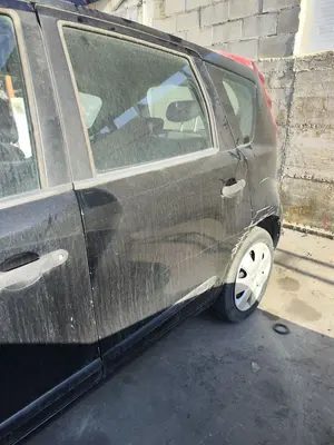 Foto de PUERTA TRASERA IZQUIERDA NISSAN NOTE (E11E) 1.4 CAT (88 CV / 65 KW)