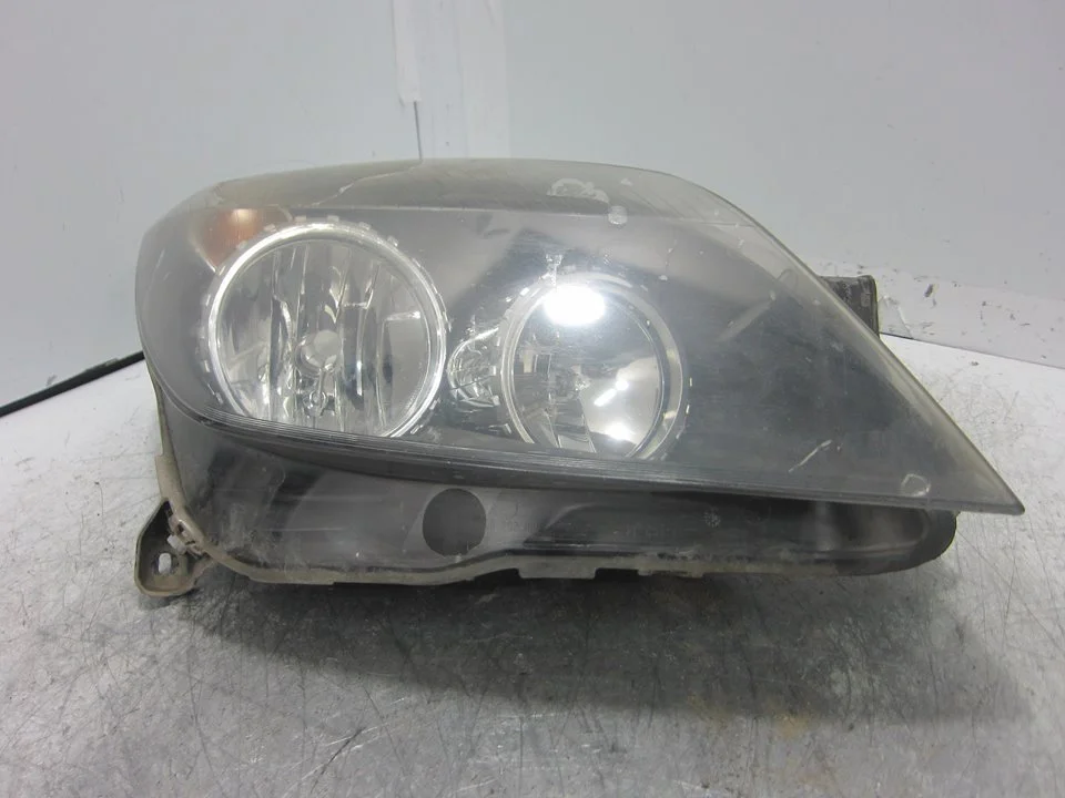 Foto de FARO DERECHO OPEL ASTRA H BERLINA 1.7 16V CDTI (101 CV / 74 KW) referencia 1EG27037002