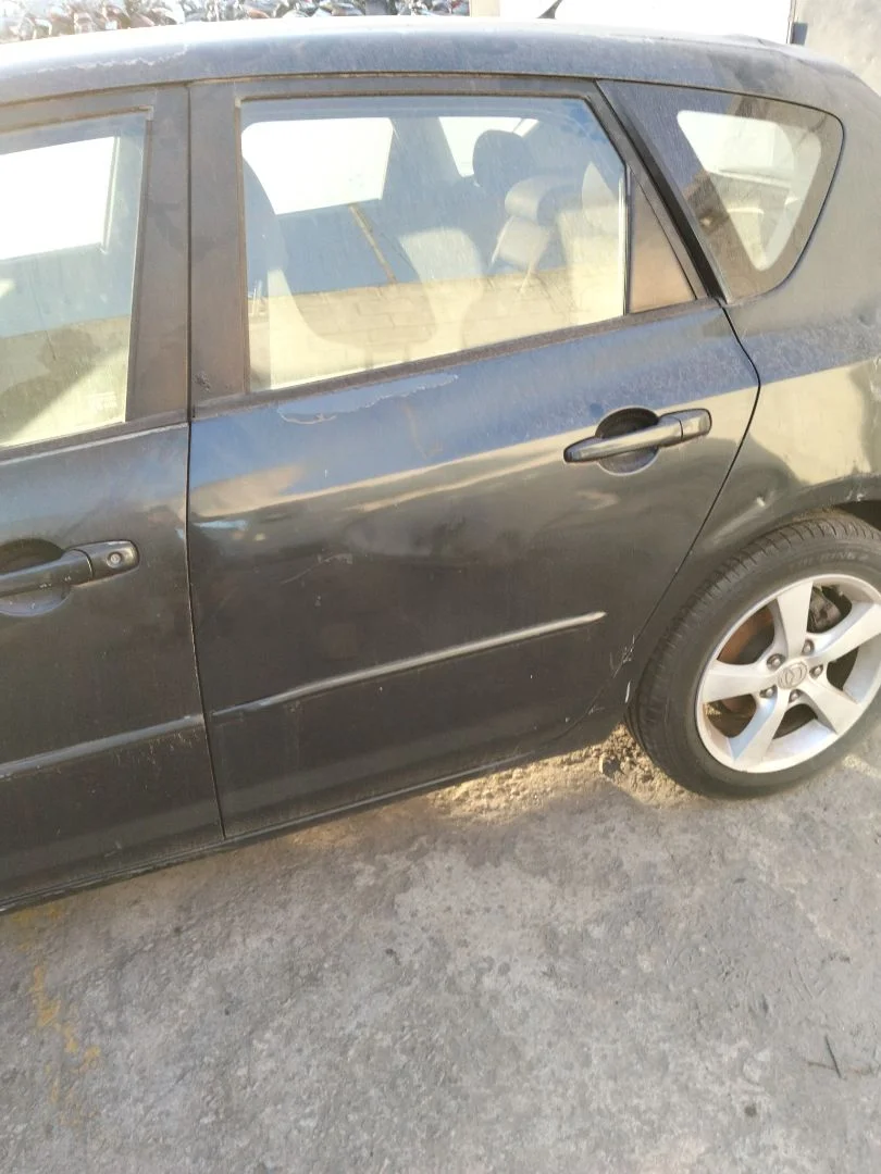 Foto de PUERTA TRASERA IZQUIERDA MAZDA 3 BERLINA (BK) 1.6 16V CAT (105 CV / 77 KW) referencia BPYK-73-02XE