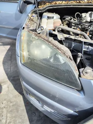 Foto de FARO DERECHO FORD FOCUS BERLINA (CAP) 1.8 TDCi Turbodiesel CAT (116 CV / 85 KW) referencia 1480985