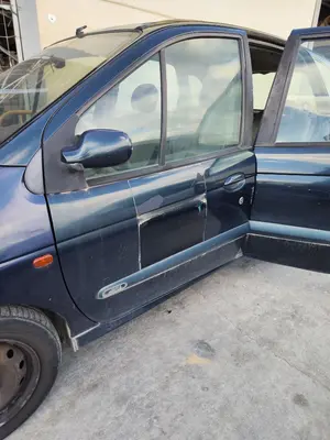 Foto de PUERTA DELANTERA IZQUIERDA RENAULT SCENIC I (JA...) 1.9 dCi Diesel CAT (102 CV / 75 KW) referencia 7751474575 foto 3