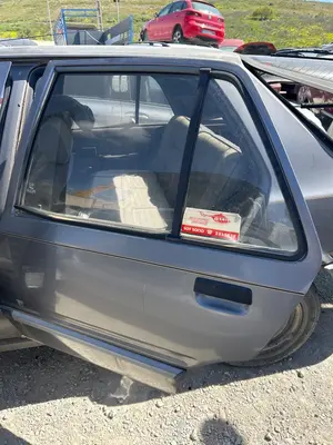Foto de PUERTA TRASERA IZQUIERDA PEUGEOT 309 1.6  (88 CV / 65 KW)