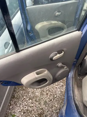 Foto de GUARNECIDO PUERTA TRASERA IZQUIERDA NISSAN MICRA (K12E) 1.2 CAT (65 CV / 48 KW)
