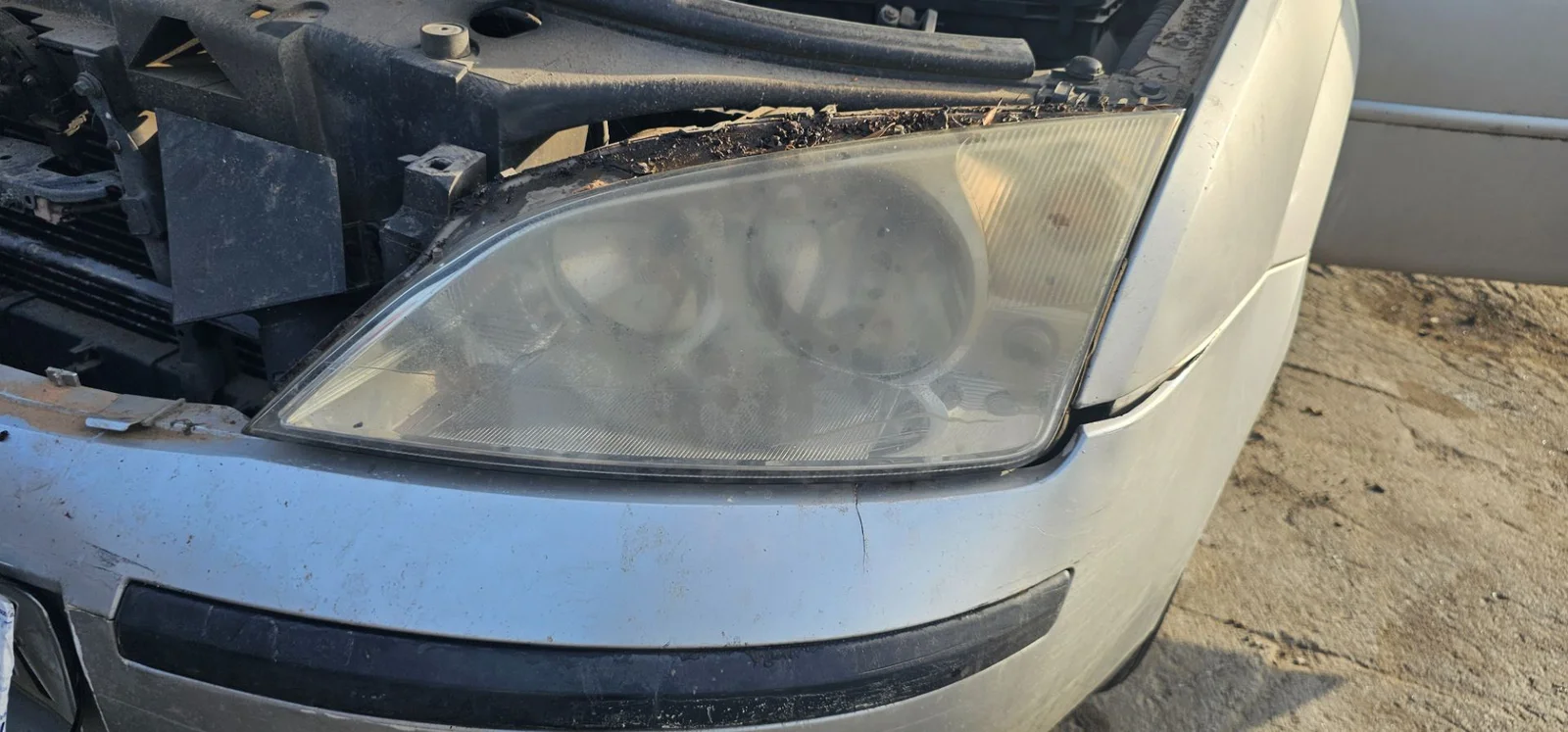 Foto de FARO IZQUIERDO FORD MONDEO BERLINA (GE) 2.0 16V DI TD CAT (116 CV / 85 KW) referencia 1435624