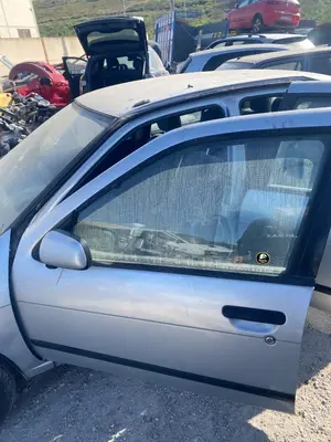 Foto de PUERTA DELANTERA IZQUIERDA NISSAN ALMERA (N15) 2.0 Diesel (75 CV / 55 KW)