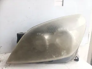 Foto de FARO IZQUIERDO OPEL ASTRA H BERLINA referencia 24451032