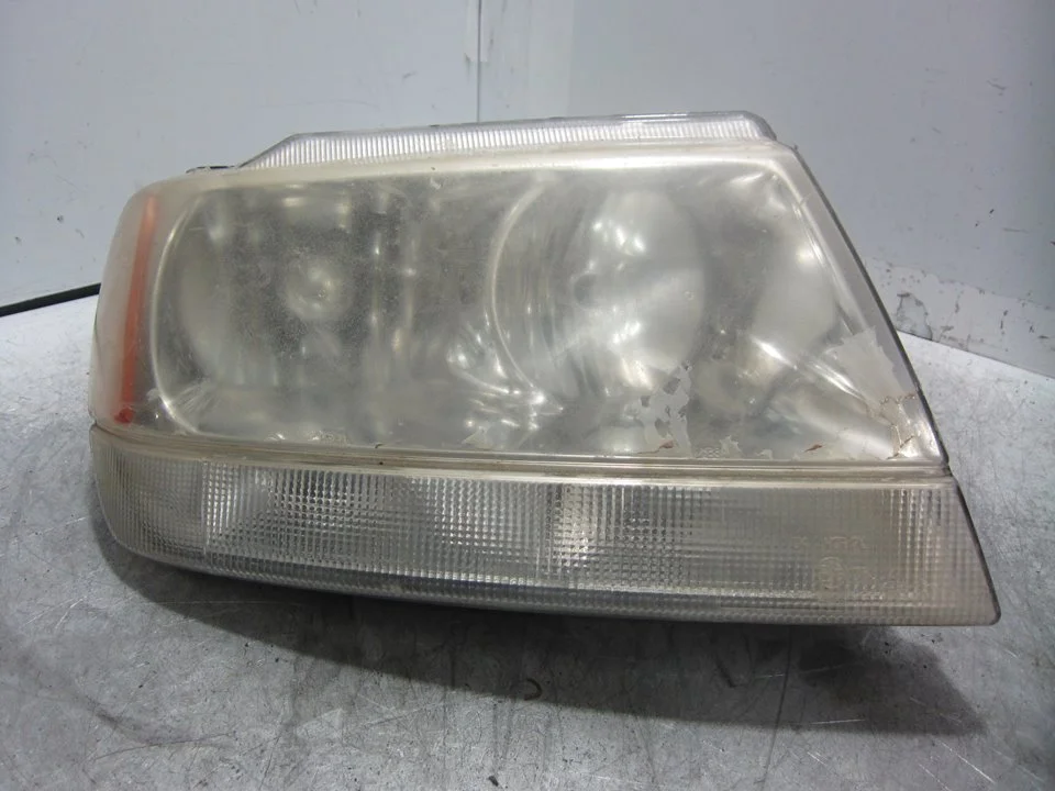 Foto de FARO DERECHO JEEP GRAND CHEROKEE (WJ/WG) 2.7 CRD CAT (163 CV / 120 KW) referencia 55155144