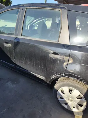 Foto de PUERTA TRASERA IZQUIERDA NISSAN NOTE (E11E) 1.4 CAT (88 CV / 65 KW) foto 2