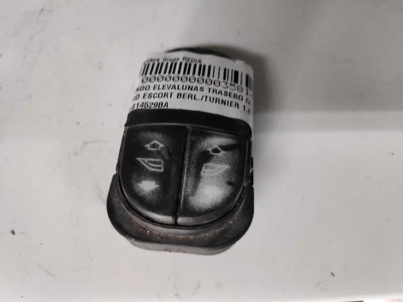 Foto de MANDO ELEVALUNAS TRASERO IZQUIERDO FORD ESCORT BERL./TURNIER referencia 95AG14529BA