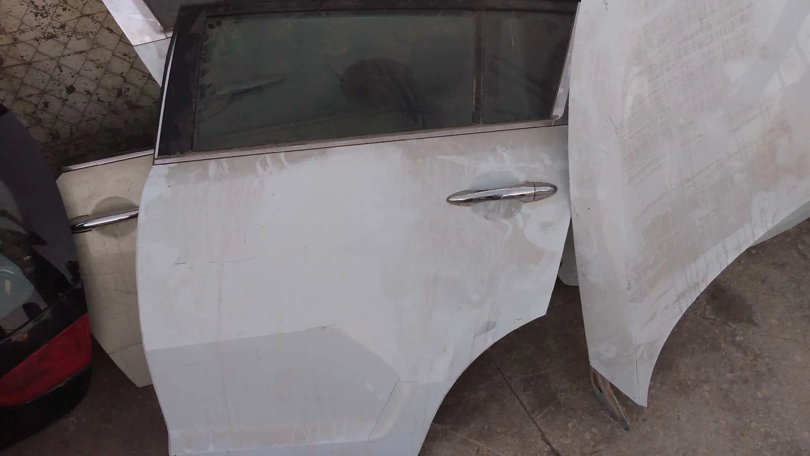 Foto de PUERTA TRASERA IZQUIERDA KIA SPORTAGE (SL)