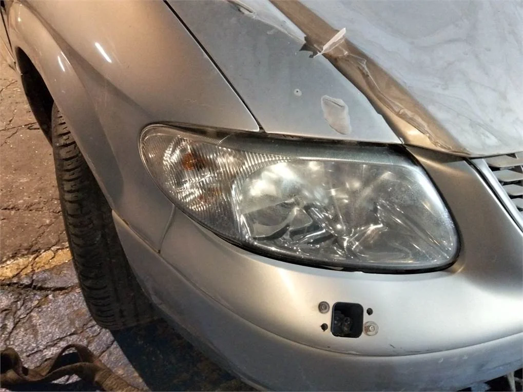 Foto de FARO DERECHO CHRYSLER VOYAGER (RG)