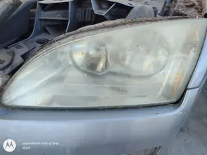 Foto de FARO IZQUIERDO FORD FOCUS BERLINA (CAP) 1.8 TDCi Turbodiesel CAT (116 CV / 85 KW) referencia 1480990