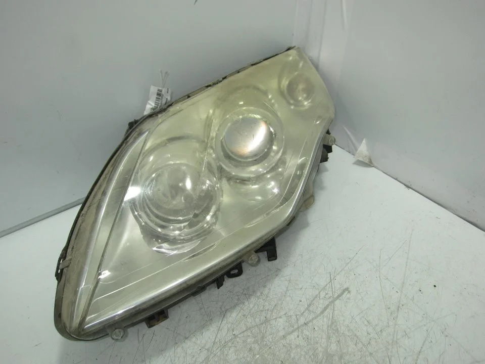 Foto de FARO IZQUIERDO RENAULT LAGUNA III BERLINA 2.0 dCi Diesel CAT (131 CV / 96 KW) referencia 89074183