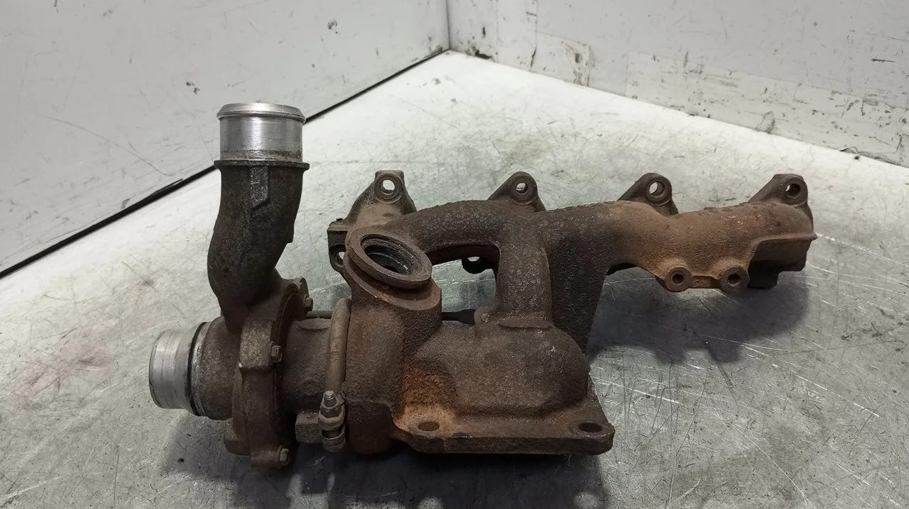 Foto de TURBOCOMPRESOR FORD FOCUS BERLINA (CAK) 1.8 TDDI Turbodiesel CAT (90 CV / 66 KW) referencia XS4Q6K682DB