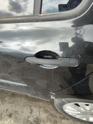 Foto de MANETA EXTERIOR TRASERA IZQUIERDA RENAULT CLIO III 1.2 16V (75 CV / 55 KW)