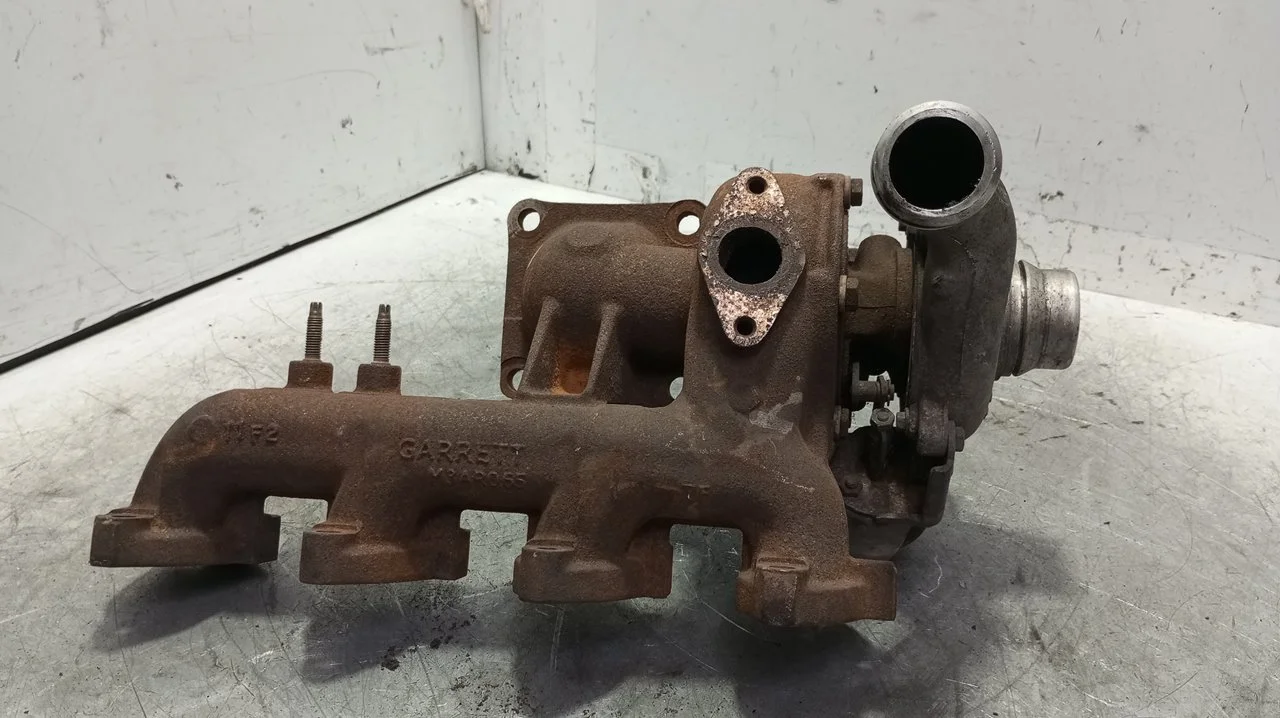 Foto de TURBOCOMPRESOR FORD FOCUS FAMILIAR (CAK) 1.8 TDCi Turbodiesel CAT (116 CV / 85 KW) referencia 1S4Q6K682AH