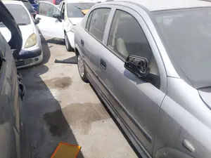 Foto de MANETA EXTERIOR DELANTERA DERECHA OPEL ASTRA G BERLINA 1.6 CAT (Z 16 SE / L55) (84 CV / 62 KW) referencia 24443945