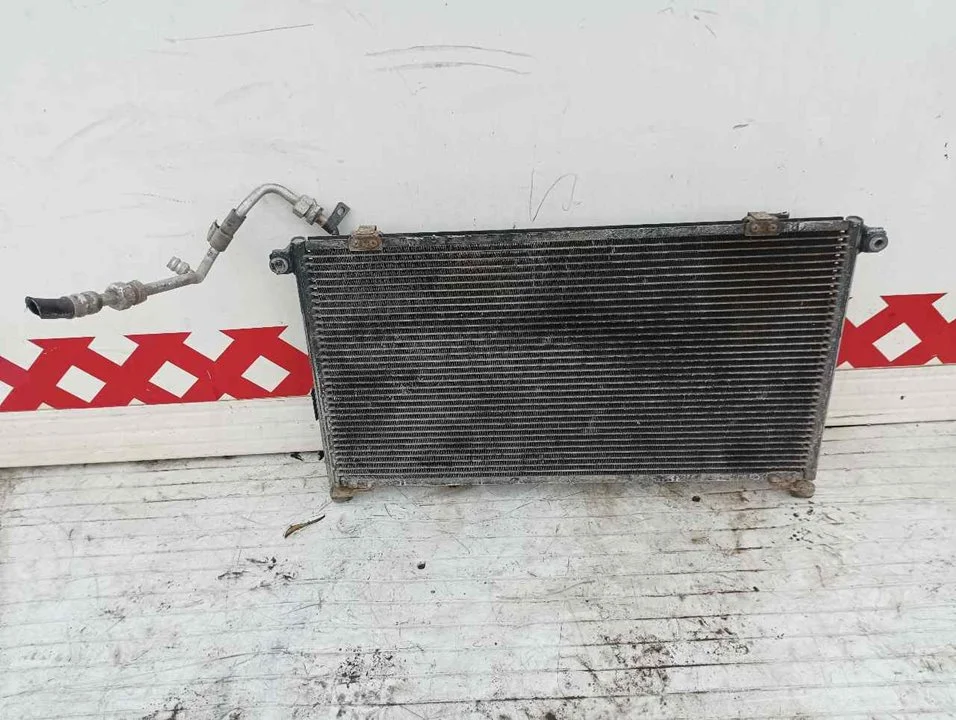 Foto de CONDENSADOR / RADIADOR AIRE ACONDICIONADO NISSAN TERRANO II (R20) 2.7 Turbodiesel (125 CV / 92 KW) referencia M308040062
