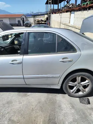Foto de PUERTA TRASERA IZQUIERDA MERCEDES-BENZ CLASE E (BM 210) BERLINA 2.2 CDI CAT (143 CV / 105 KW) referencia A210730230528